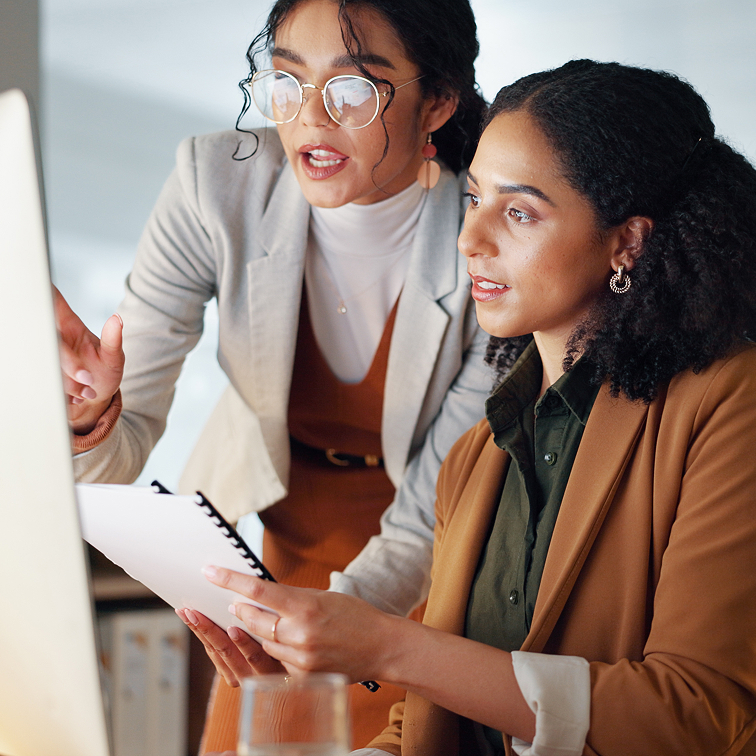 photo of two teachers working side by side
